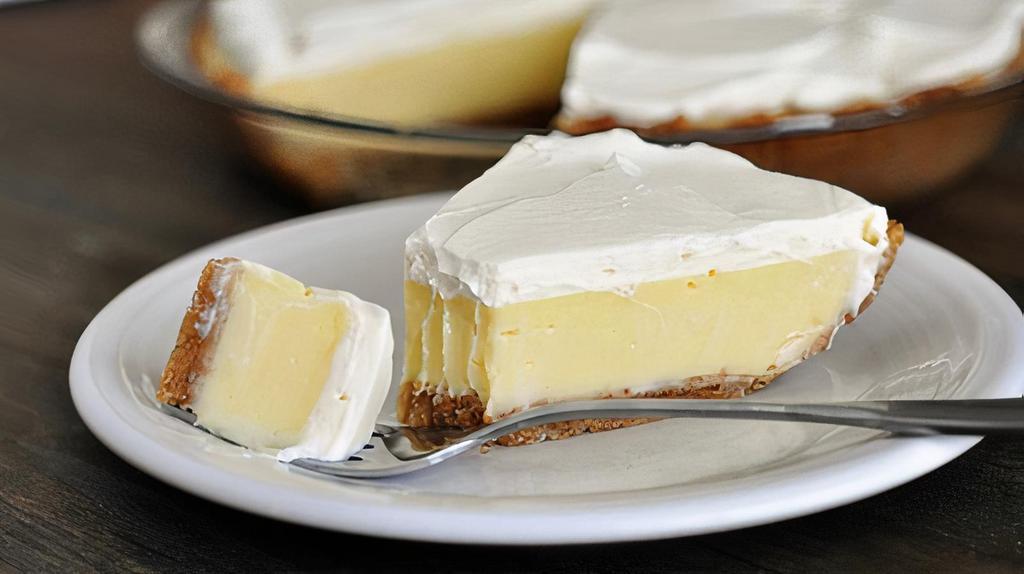 Lemon Cream Pie (Slice) · A luscious lemon flavor perfectly balanced with a creamy sweetness baked in a Graham cracker crust.