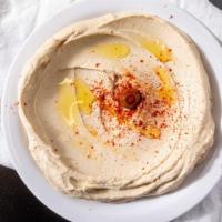 Spicy Hummus · Vegan. Garbanzo beans, garlic, tahini sauce, and our signature spicy blend topped with olive...