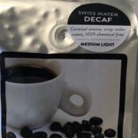 Swiss Water Decaf Whole Coffee Beans · Caramel aroma, crisp cedar notes, 100% chemical free.  Whole Coffee Beans.  Fair Trade