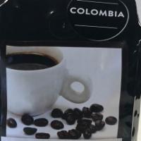 Dark Colombia Whole Coffee Beans · Sweet tobacco aroma, full body, bittersweet finish.  Whole Coffee Beans.