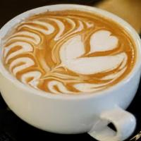 Cappuccino · A traditional Italian style Cappuccino - one third double shot espresso, one third milk, and...