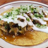Chicken Taco · Slightly spicy chicken, onion and cilantro