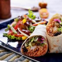 Lunch Burrito · Large Flour Tortilla, Refried Beans, Mexican Rice Cheese, Grilled Onions, Avocado Sauce, Tor...