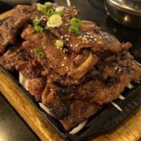 Galbi / 갈비 · Sweetly seasoned grilled short-ribs.