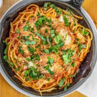 Spaghetti & Meatballs · House marinara, Parmesan, and fresh basil.