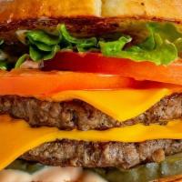 Double Cheeseburger · Two fresh, never frozen patties on a brioche bun with American cheese, fry sauce, lettuce, t...