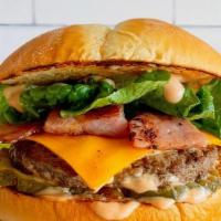 Super Burger · Fresh, never frozen patty on a brioche bun with ham, fry sauce, lettuce, tomatoes, pickles a...