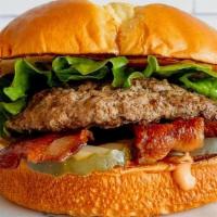 Bacon Burger · Fresh, never frozen patty on a brioche bun with hardwood smoked bacon, fry sauce, lettuce an...