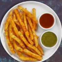 Masala Fries Madness · Golden crispy fries topped with our house made tikka masala sauce.