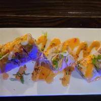 Sunset Roll · Shrimp tempura, spicy tuna, avocado, seared tuna, salmon on top, spicy mayo and sweet chili,...