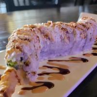 White Dragon Roll · Shrimp tempura roll with crab on top and spicy mayo, unagi sauce and scallion