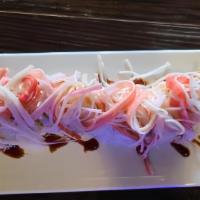White Tiger Roll · Shrimp tempura roll with escolar on top, mani stick and unagi sauce