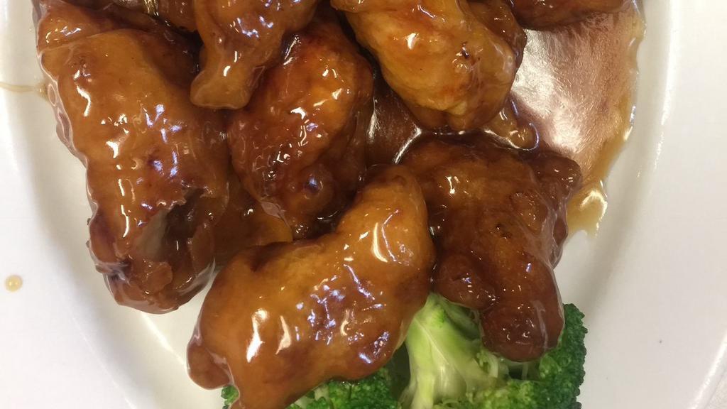 Orange Chicken · Hot & spicy. Hot chunk of chicken with red hot sauce on broccoli bed.