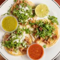 Tripas Taco · Served with cilantro, onion and hot sauce.