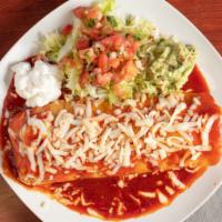 Vegetarian Burrito · Includes rice, beans, shredded lettuce, shredded cheese, pico de gallo, and guacamole.