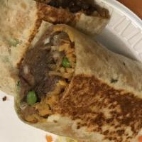 Cabeza Burrito · Includes rice, beans, onion, and cilantro inside.