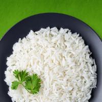 Steamed White Rice   · Our long grain aromatic basmati rice, steamed to perfection.