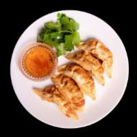 Pot Stickers (6) · Chicken filling with onion, cabbage, carrot, and radish. Served with savory sweet chili soy ...