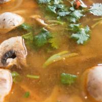 Tom Yum Soup · Traditional Thai hot and sour soup. Your choice of chicken, pork, or tofu, with galangal, le...