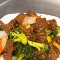 Broccoli Beef · Tender beef strips with broccoli, carrots and onion stir fried in a brown sauce.