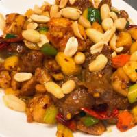Kung Pao Combination · Spicy. A combination of chicken, beef and shrimp with zucchini, celery, carrots and water ch...