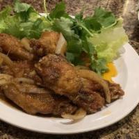 Canh Ga Chien Bo | Fried Chicken Wings In Butter · Mixture of six winglets stir fried in butter.