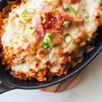 Kimchi Cheese Fried Rice · Spicy. mama's kimchi fried rice with bacon, topped with mozzarella cheese.