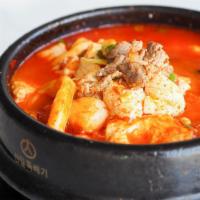 Soondooboo · Spicy. spicy soft tofu stew with vegetables, seafood, and beef.  Served with white rice and ...