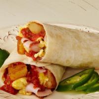 Breakfast Burrito · Eggs, potatoes, cheddar, and green chile add ham, bacon, sausage, turkey, or avocado at an e...