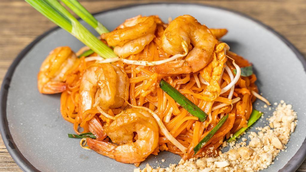 Pad Thai  · Gluten free. Rice noodles stir fried with egg, chives, and bean sprouts, with traditional tamarind sauce topped with peanut and lime.