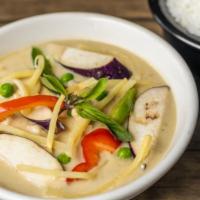 Green Curry · Green curry paste cooked with bamboo shoots, bell peppers, eggplant, peas and Thai basil in ...