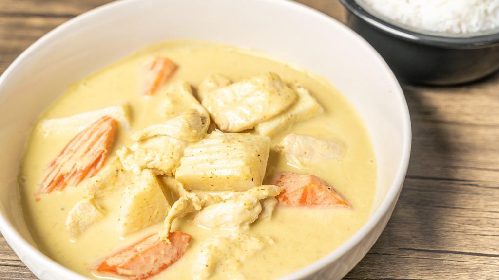 Yellow Curry  · Yellow curry paste cooked with potatoes and carrots.