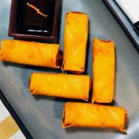 Thai Crispy Rolls  (5)  · Crispy golden brown vegetarian rolls served with sweet and sour sauce.