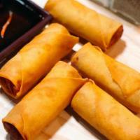 Thai Crispy Rolls (5)  · Crispy golden brown vegetarian rolls served with sweet and sour sauce.