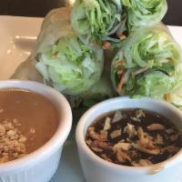 Fresh Spring Rolls With Tofu · Freshly rolled with iceberg lettuce, carrot, mints, rice noodle and served with a side of Th...