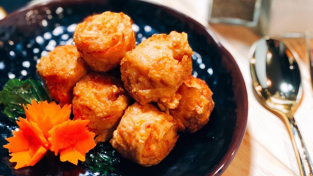 Shrimp Balls  · Served with sweet chili sauce and cucumber.