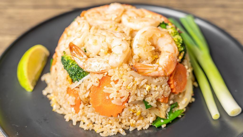 Thai Fried Rice (Khao Pad)  · Thai jasmine rice stir with egg, tomatoes, carrots, onions, green onion, tomato, and broccoli.