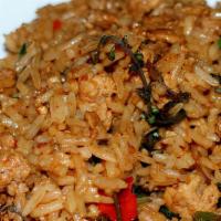 Spicy Fried Rice  · Spicy. Thai jasmine rice stir with egg, chili, onions, bell peppers, green onions, basil, an...