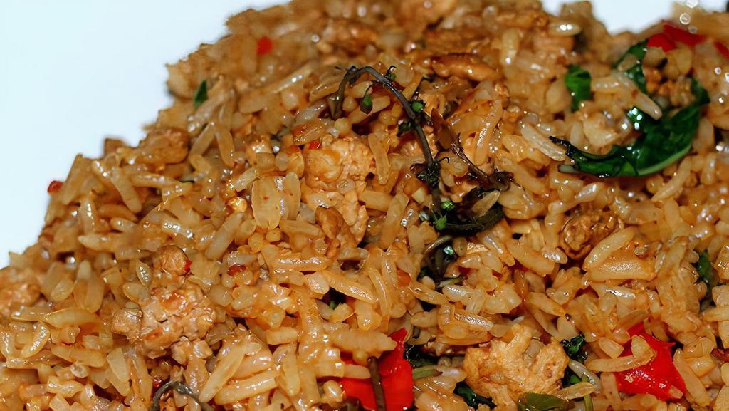 Spicy Fried Rice  · Spicy. Thai jasmine rice stir with egg, chili, onions, bell peppers, green onions, basil, and topped with crispy basil.