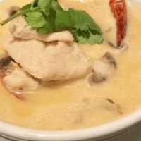 Tom Kha Kai  (Coconut Soup) · Coconut soup served with chicken and Thai herbs.