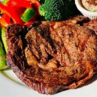 Crying Tiger (Rib Eye 12Oz)!!! · Grilled rib eye 12oz. with a spicy roasted rice and tamarind sauce served with grilled aspar...