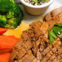 Moo Yang (Bbq Pork) · Authentic Thai style marinated and grilled pork tenderloin served with special house sauce a...