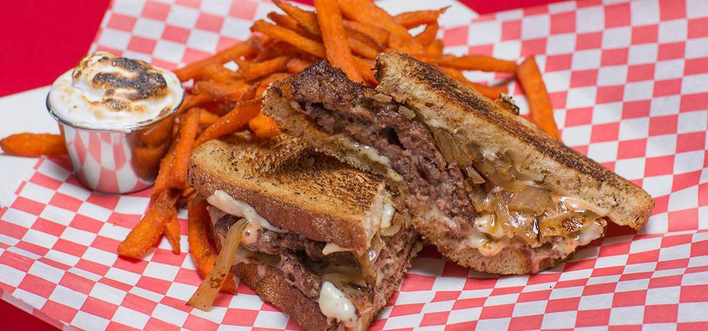 Luck Of The Irish Burger · Two steakburger patties, swiss cheese, grilled onions and matty g's fry sauce on marble rye bread
