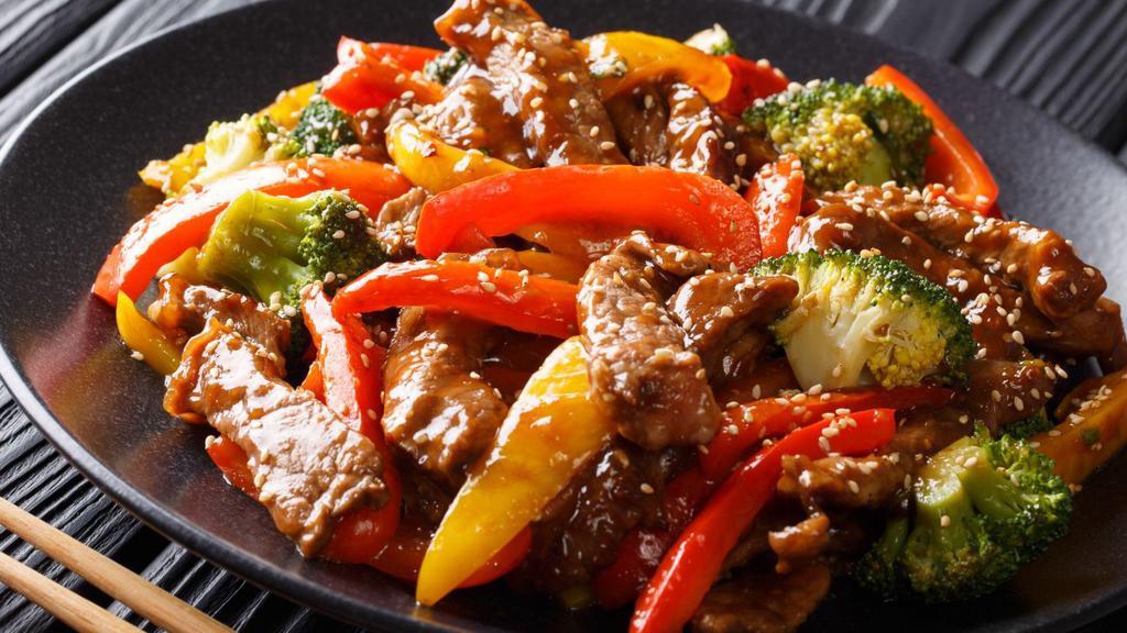 Teriyaki Beef Bowl · Delicious bowl is full of beef in homemade teriyaki sauce, broccoli, and carrots, served over white rice.
