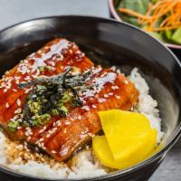 Unagi Bowl · Delicious bowl is full of steamed white rice, topped with fillets of eel (unagi) grilled in ...
