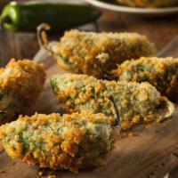 Jalapeño Poppers (4 Pcs) · Delicious jalapeño poppers filled with cream cheese and then baked to perfection.