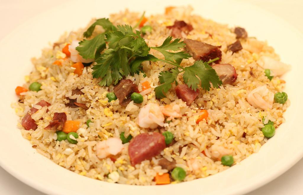 Combination Fried Rice · Bbq pork, shrimp, pork sausage, egg, peas, and carrots.
