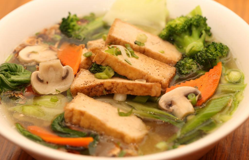 Vegetarian Pho · Vegetables soup with rice noodles, Tofu, broccoli, mushroom, carrot, cabbage, celery, green leaf bokchoy