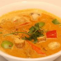 Vegetarian Curry Soup · Vegetarian curry soup with Tofu, potatoes, sweet potatoes, bell peppers, mushrooms, carrots ...