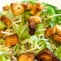 Caesar Salad · Chopped Romaine lettuce, parmesan cheese topped with our house made croutons & Caesar dressi...